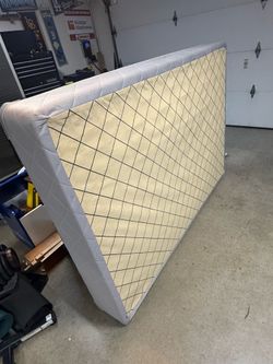 Mattress and Box Springs $20    Mattress has a coffee stain but is in good condition