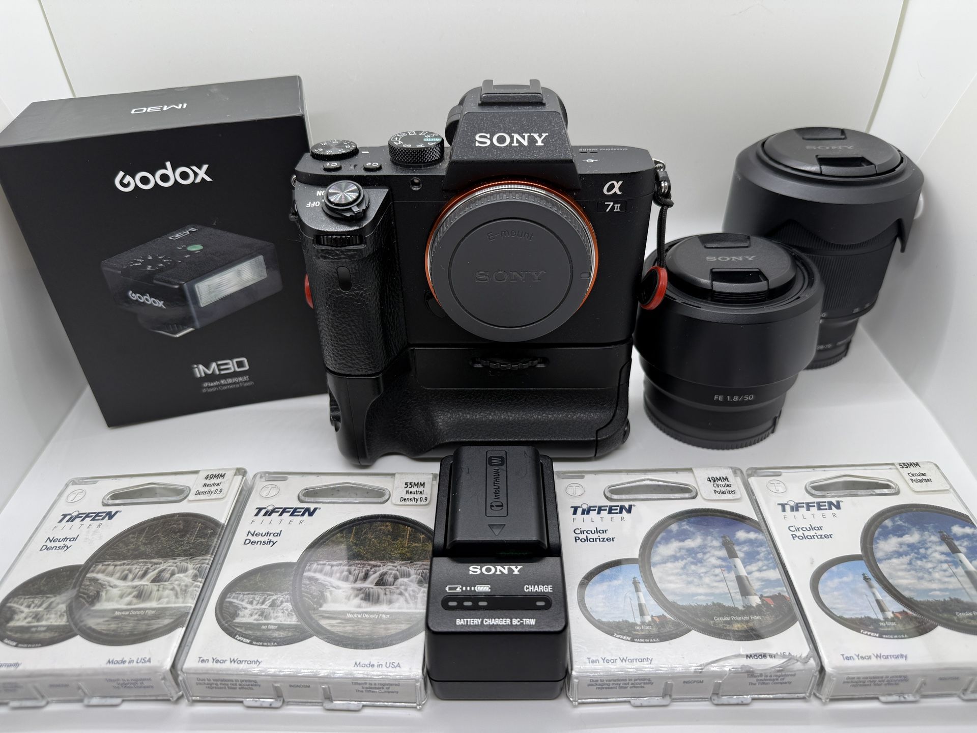 📸 Sony A7II Full Frame Camera Bundle – 2 Lenses + Battery Grip + Tiffen Filters + 3 Batteries + Godox Flash