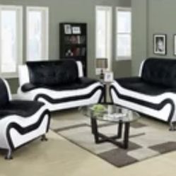 Fairly new Black And white Leather couches