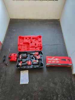 M18 Milwaukee fuel combo sawzaw and hammer drill/ drill