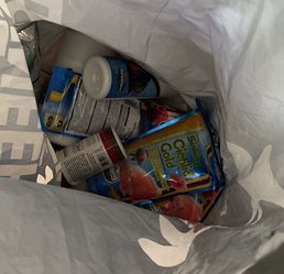 bag of cichlid food and tank treatments 