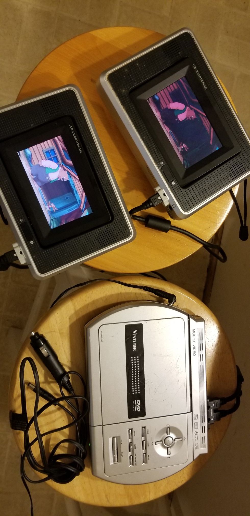 Auto / SUV DVD player with two headrests monitors.