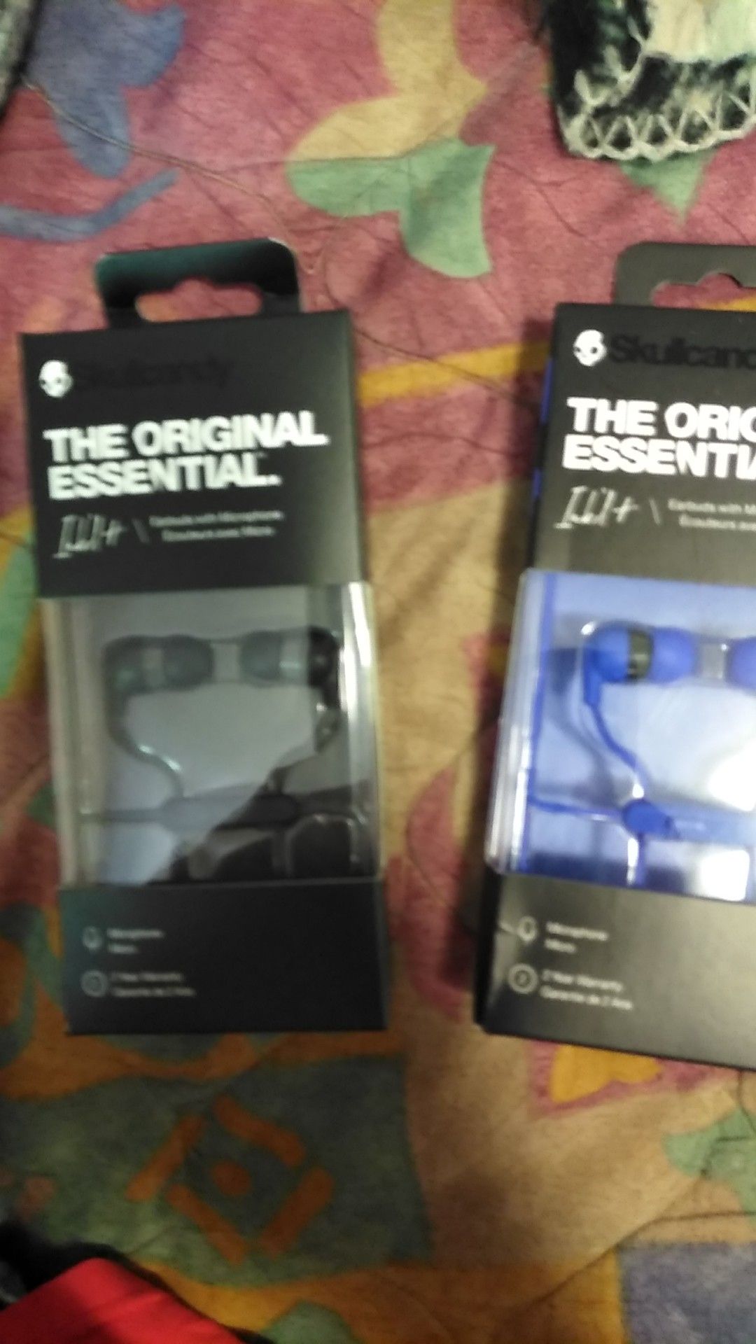 Two sets of Skullcandy headphones with microphone brand new