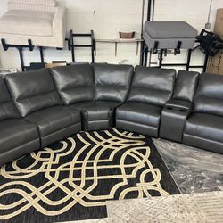 New Power Reclining Sectional.  Grey Or Black Leather Are.  133”x117”x41”H.  Free Delivery!