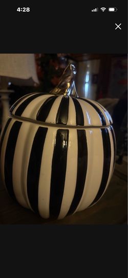 Black and white ceramic pumpkin container