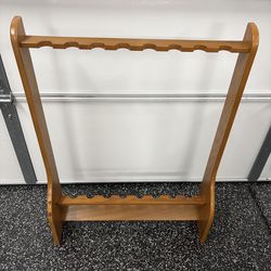 Beautiful wood, eight fishing pole or billiard Q holder