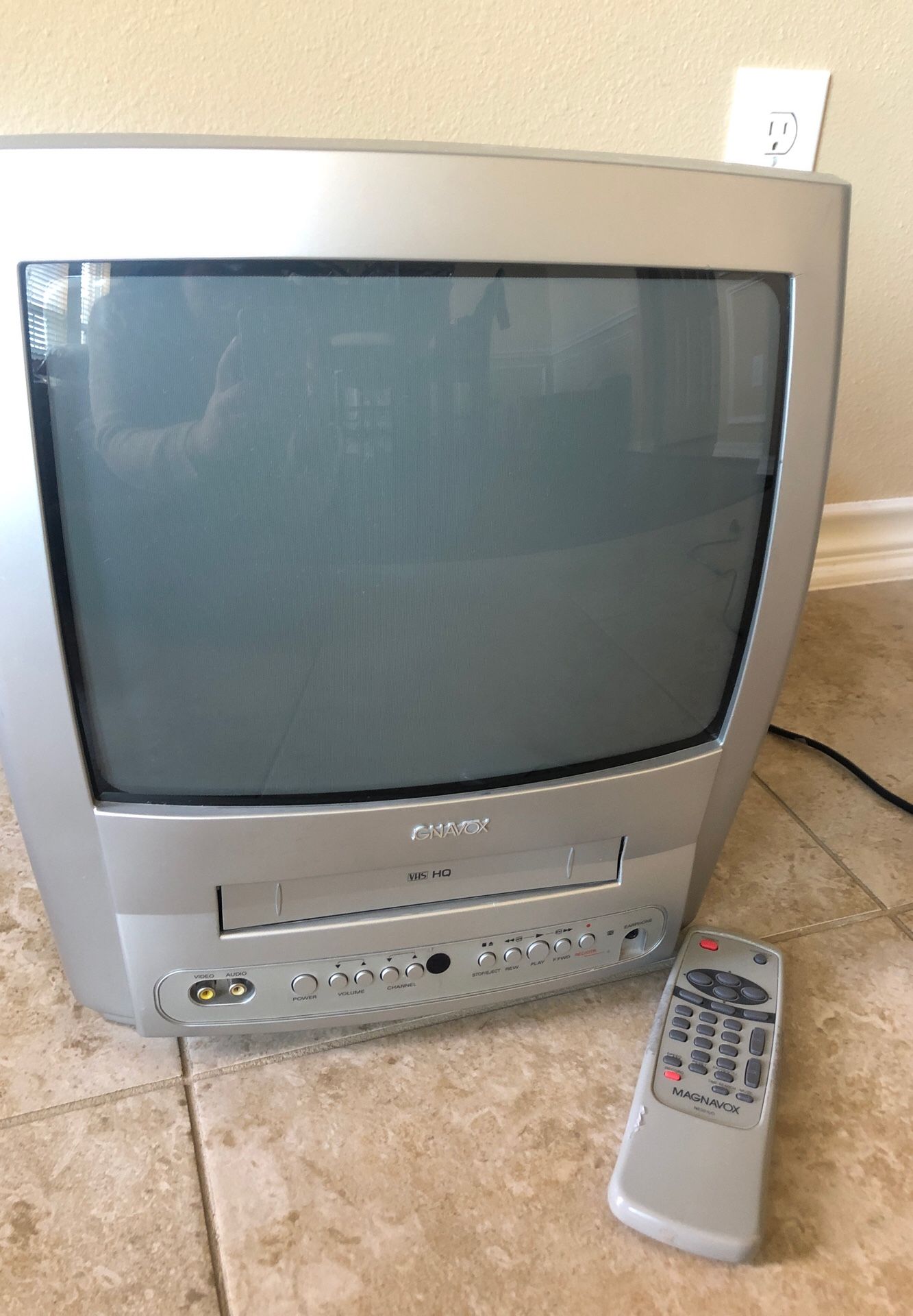Gray Magnavox tv with vhs player