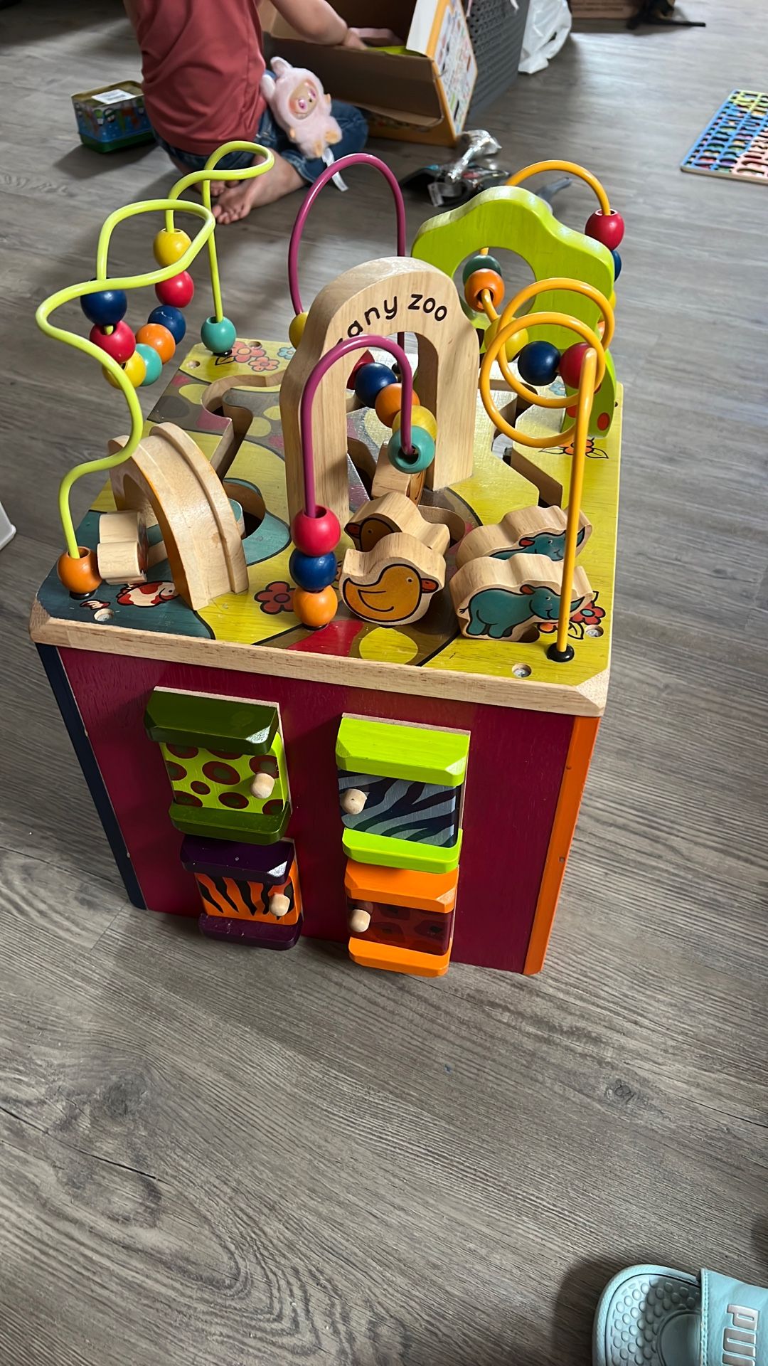 B. Toys Wooden Activity Cube - Zany Zoo