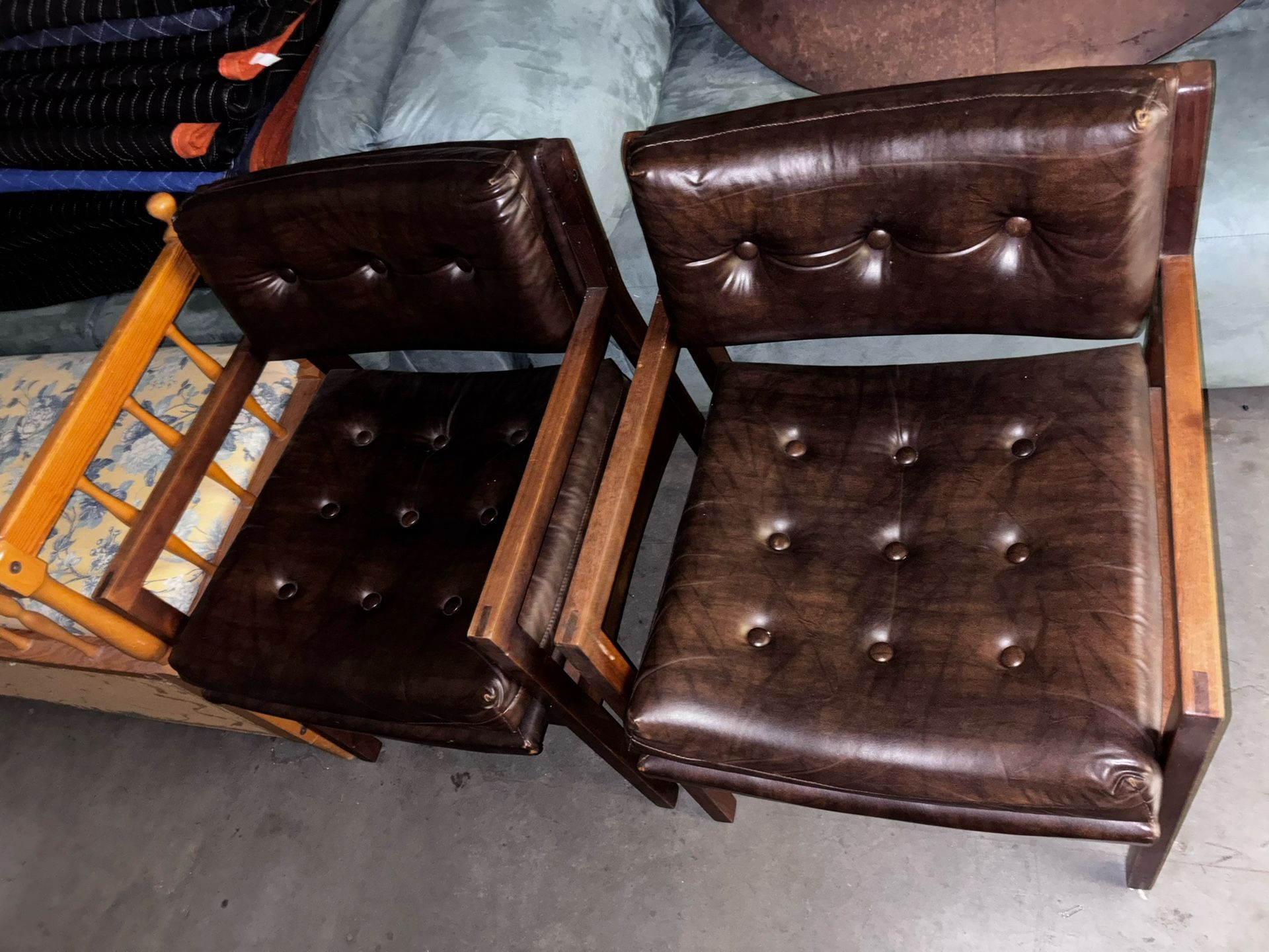 Two Matching Leather Chairs