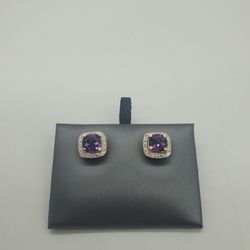 14KT YELLOW GOLD DIAMOND EARRINGS WITH PURPLE STONE 