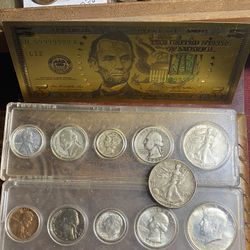 Lot two mint sets one 1964 the other 1943 with a rare 1943 mint mark a