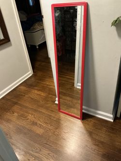 A door mirror, a little old, red