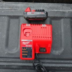MILWAUKEE 12/18V CHARGER AND 1 2.0 BATTERY  PERFECT CONDITION 
