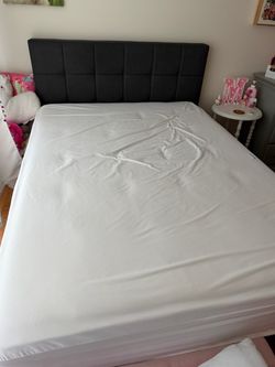 Full size mattress with mattress, protector, and full-size bedframe like new
