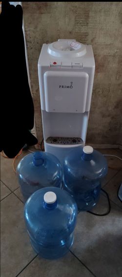 Water Dispenser w/ 3 jugs.