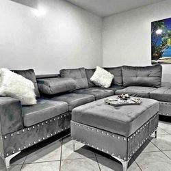 Grey Velvet Reversible Sectional With Cup Holder And Storage Ottoman. Brand New. 