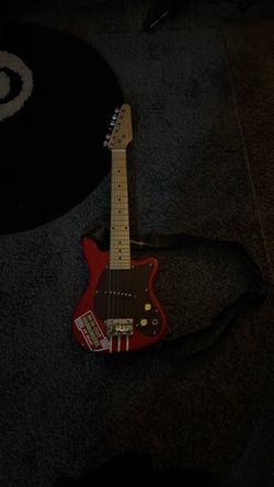 Fao shwarz mini guitar