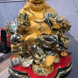 Gold-tone Laughing Buddha statue 