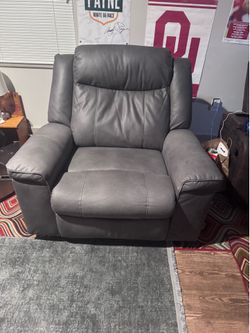 The grey recliner shown is the Signature Design by Ashley Status Check Rocker Recliner (Model PC).Standard DimensionsThe overall dimensions for