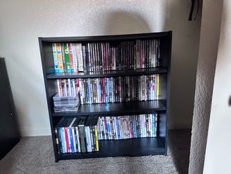 Small shelving unit- movies not included
