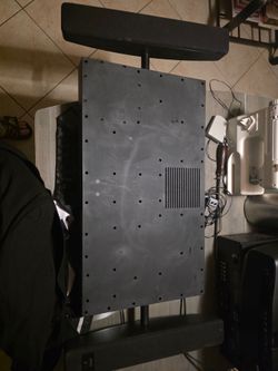 Audio solutions speakers for behind TV mounting with built in subwoofer