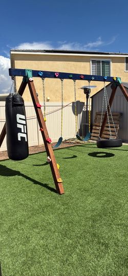 Wooden Swing Set with Punching Bag and Climbing Wall