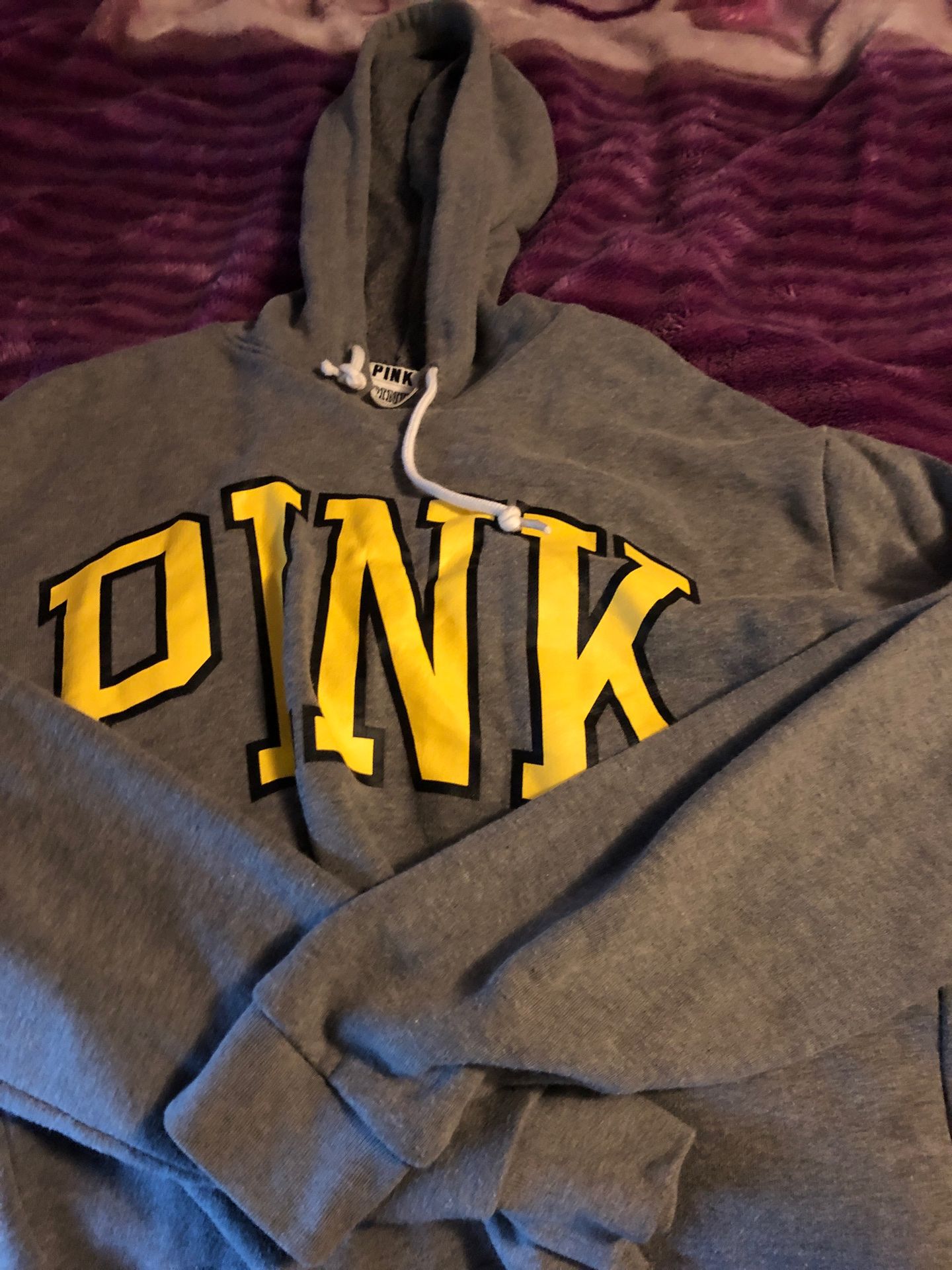 Small but it fits medium too VS sweater very cute