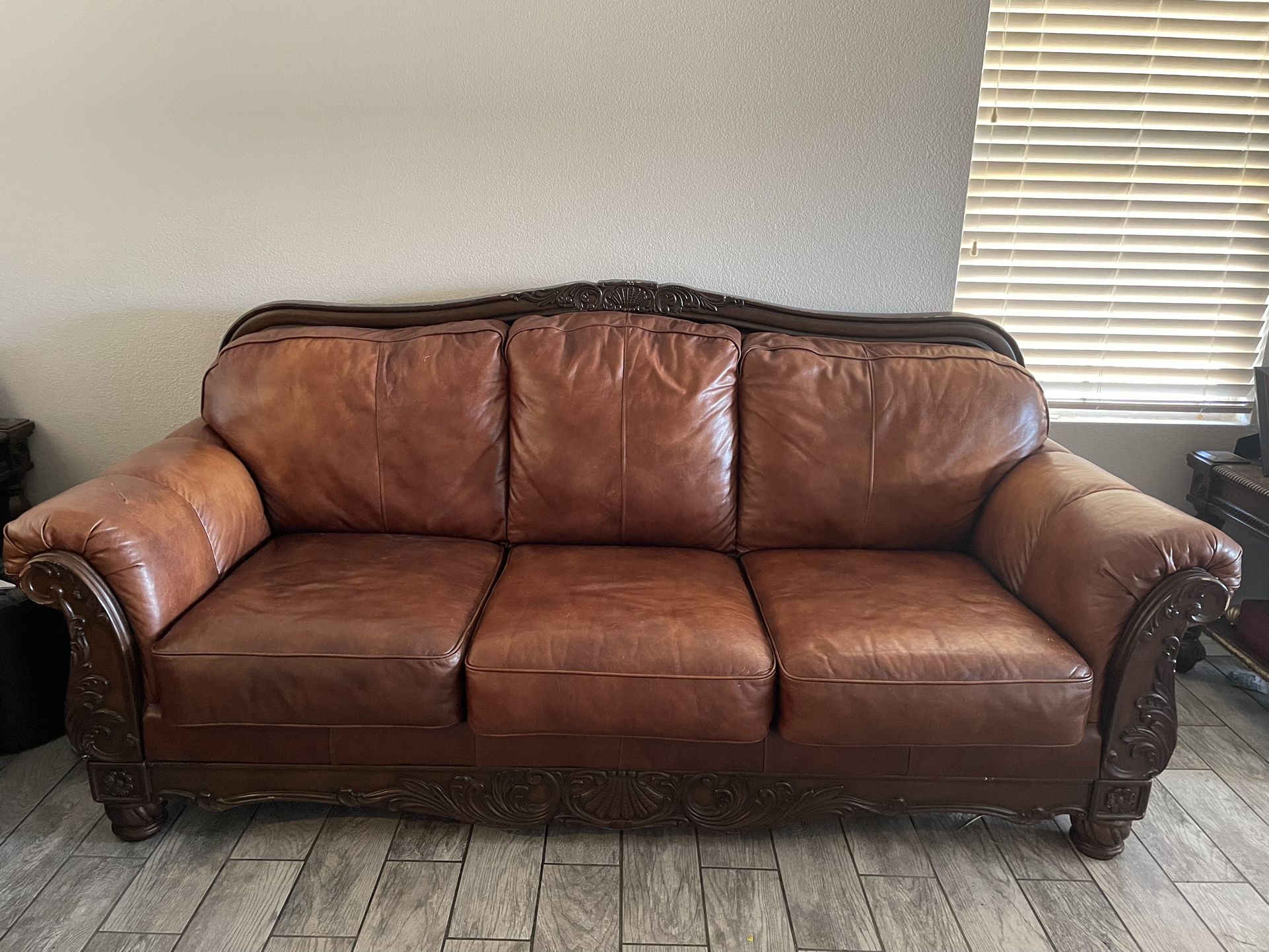 Large and Medium Sized Brown Leather Sofa