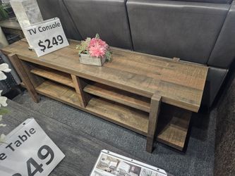 Brand new brown TV stand (55"x26"H)