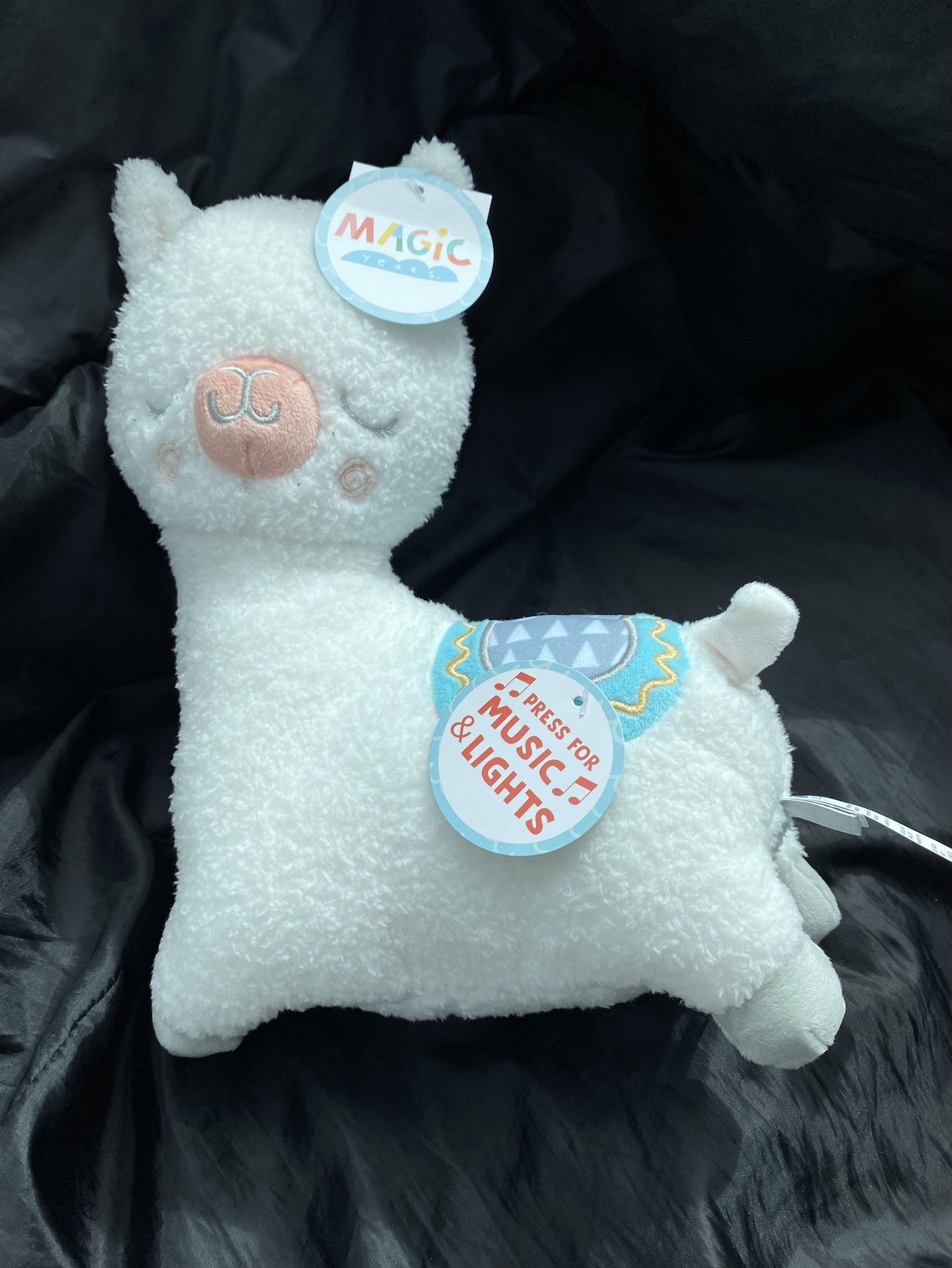 musical plush lama toy with lights for baby’s nursery 