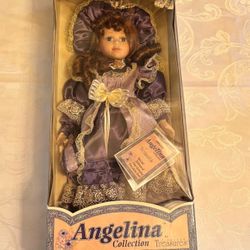 Rare 2001 Angelina Collection porcelain doll in Royal Purple-Timeless Treasures 