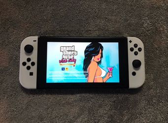 Nintendo Switch with 100 Popular Switch Games + 7500 Classic Games
