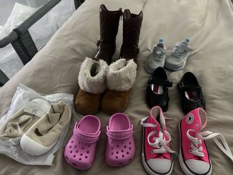 Lot of toddler girl shoes.