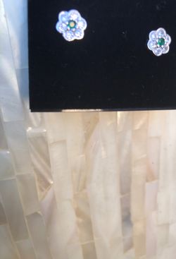 Sterling silver stud earrings with green stone