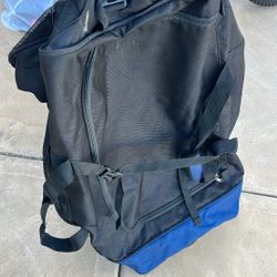 Large lightweight bag with wheels on it