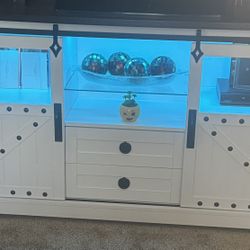 TV Stand with Storage. Colored lights with remote required