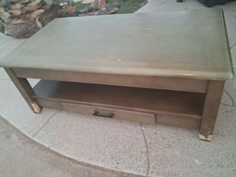 Coffee table hydroelectric lift top