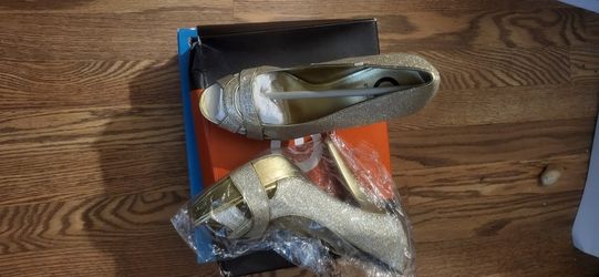 Size 9 Guess High Heels. NEW in box. Never Worn. Still in original tissue & bo.
