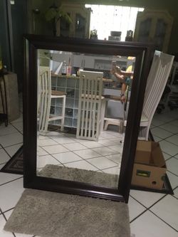 Beveled mirror,wood frame, good condition, 50” x36”