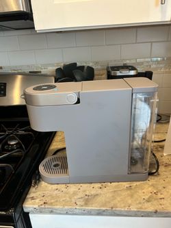Grey Keurig coffee maker