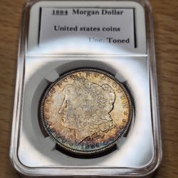 1884 Toned Morgan Silver Dollar 