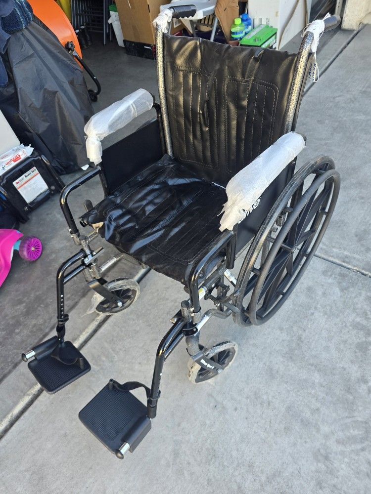Silver Sport 2 Wheelchair with Desk Arms, Elevating Leg Rests and 18 in. Seat