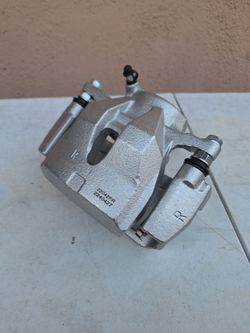 BRAND NEW Toyota driver's side front brake caliper