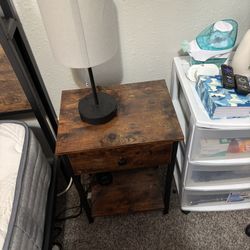 Night Stand And A Lamp