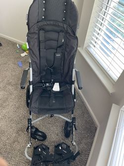 Adaptive stroller for children with mobility needs—never used, retails $2-3K.