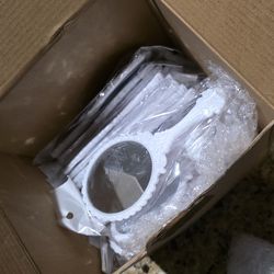 Hand size mirrors. White in color. 40 in each box. 4 boxes total.