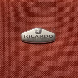 Ricardo Beverly Hills Carry On Luggage Laptop Bag Rolling 17”x13”x9” Under Seat. Vintage burnt orange.