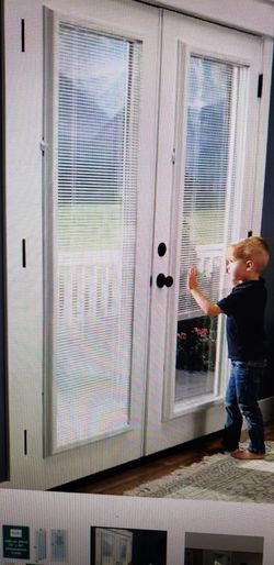 White cordless add-on blinds for a raised frame door glass 21 and 3 fourths inch width by 65 and 3/4 inch height