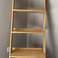 leaning book shelf