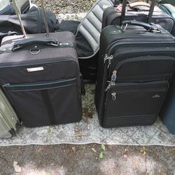 LOTS OF NICE PULL ALONG LUGGAGE 